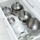 you can create an organized living space in your kitchen, image of organized pots and pans